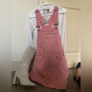 Pink overalls with boots 6.5
